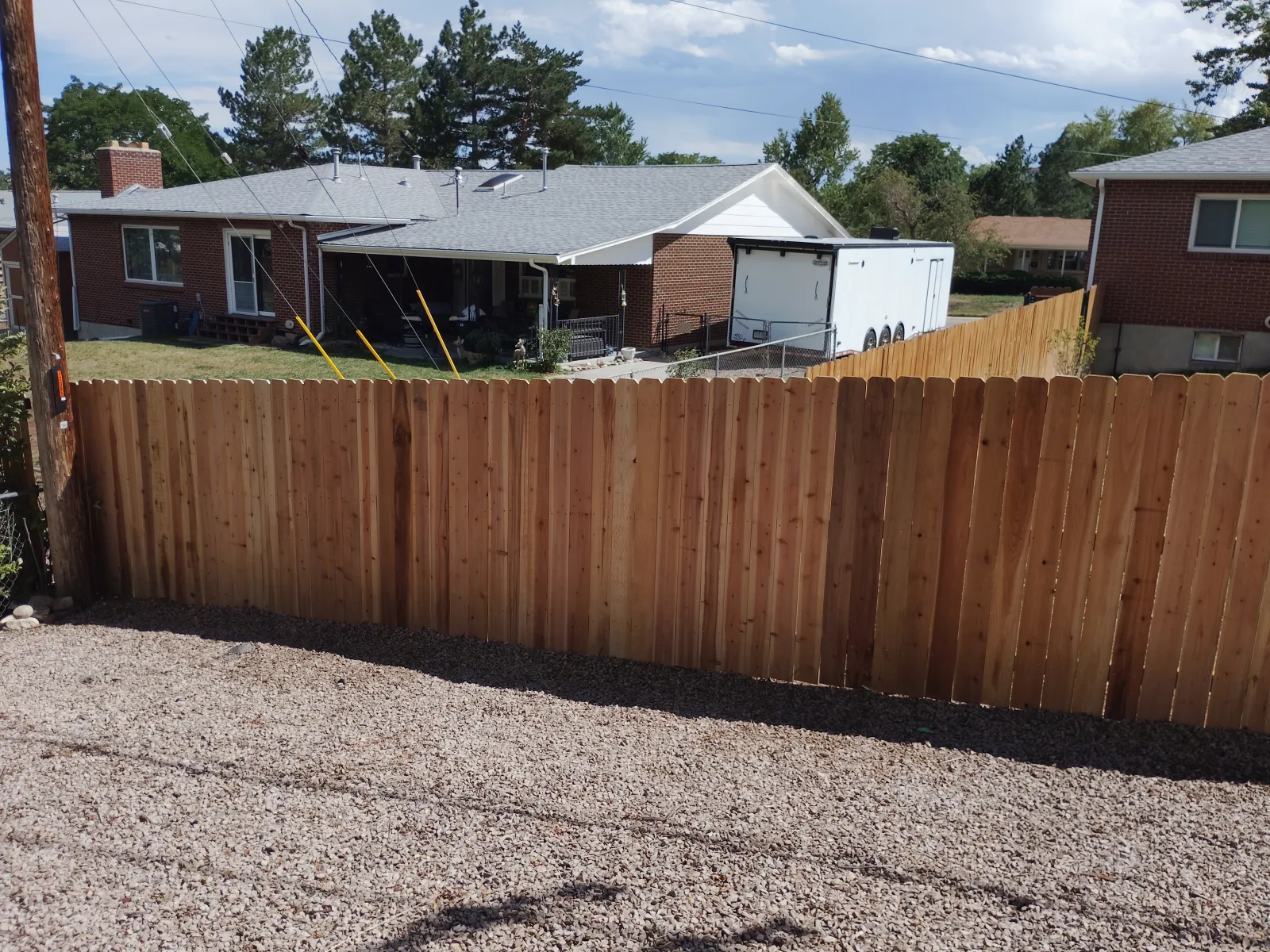 Completed cedar vertical privacy fence in Lakewood, Colorado