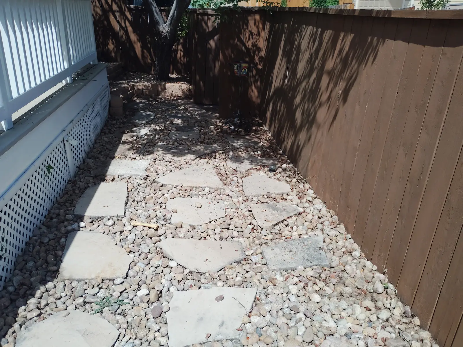 Ground cover encroaching the gravel beds