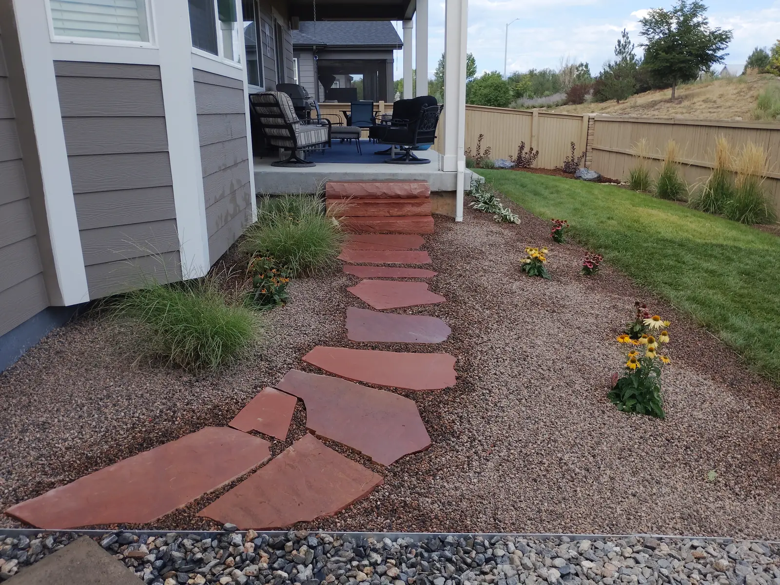 Flagstone stepping path leading up to the front steps in Longmont, CO