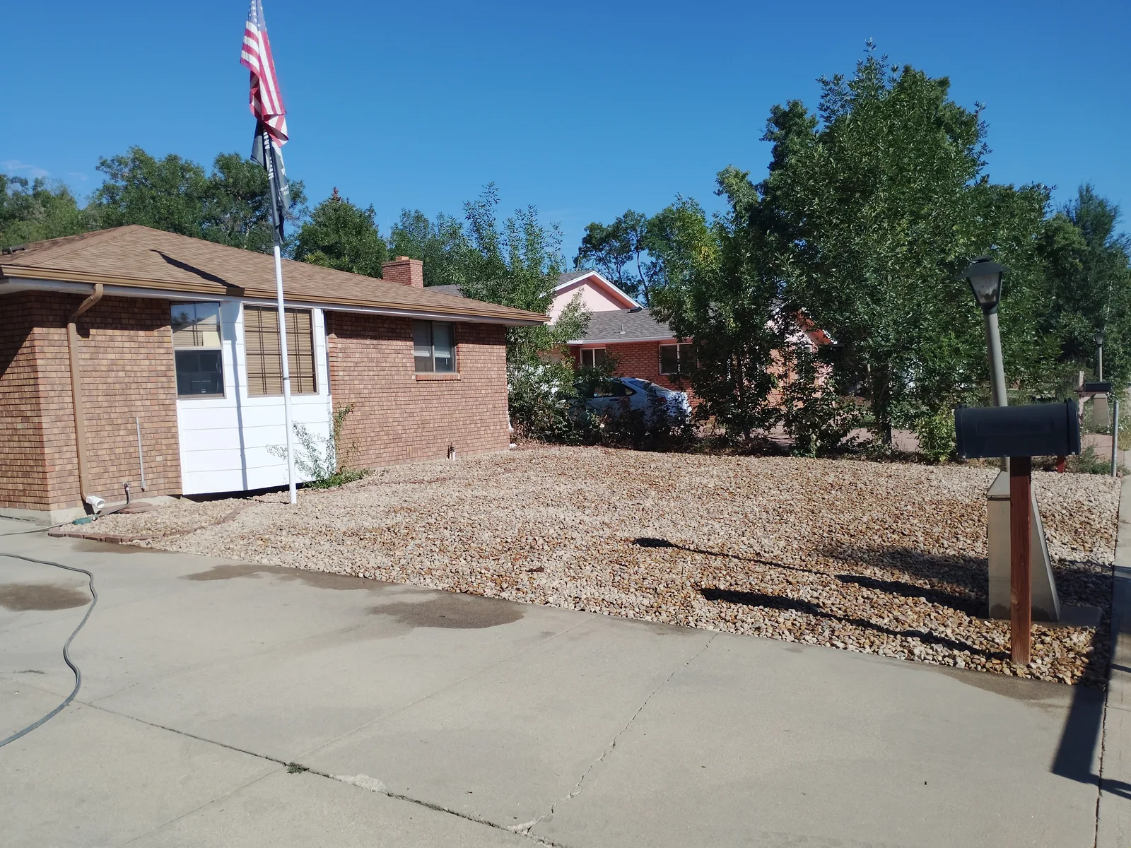 Finished river rock front yard surface
